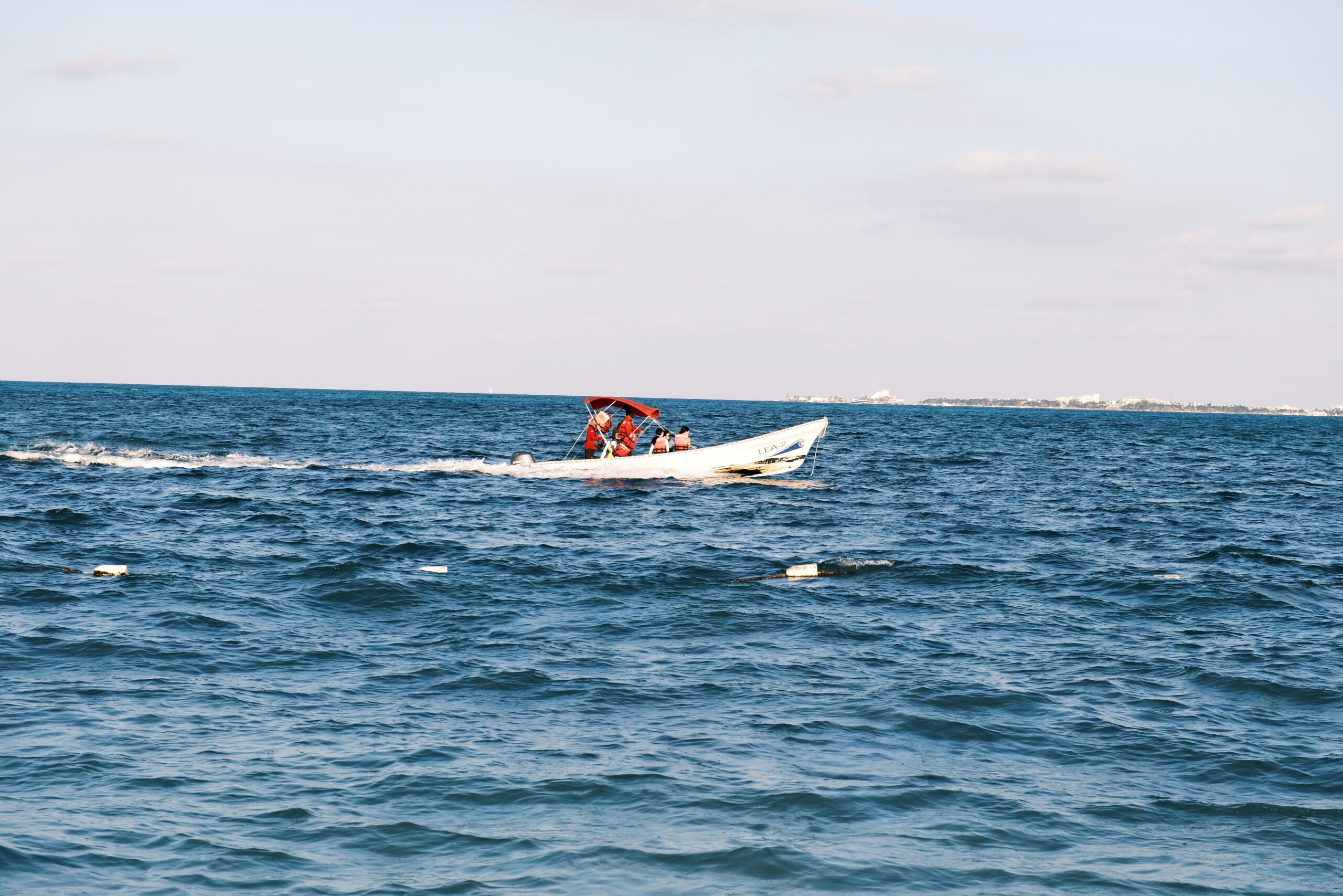 Ocean with a small boat