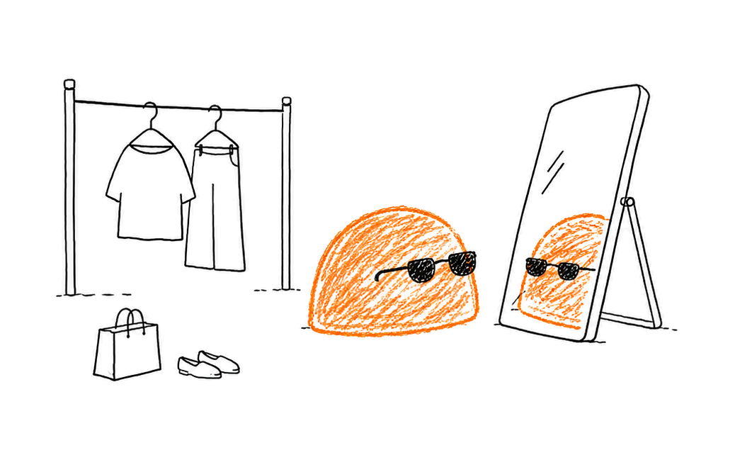 Voderrn — orange trying on looks at the mirror