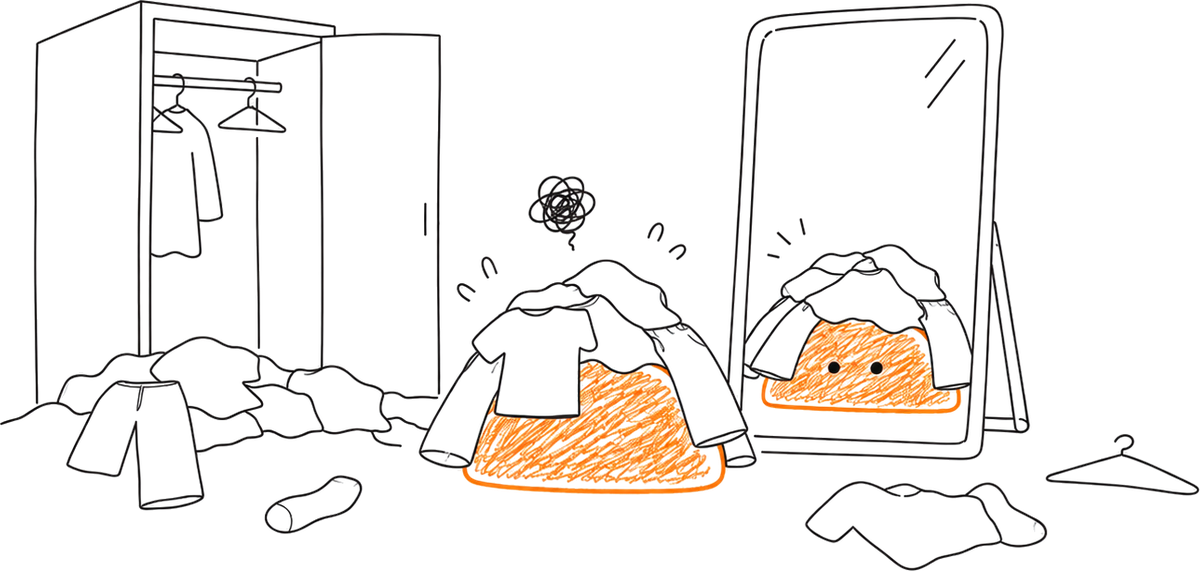 An orange buried under a pile of clothes in front of a mirror, wardrobe open and clothes all over the floor